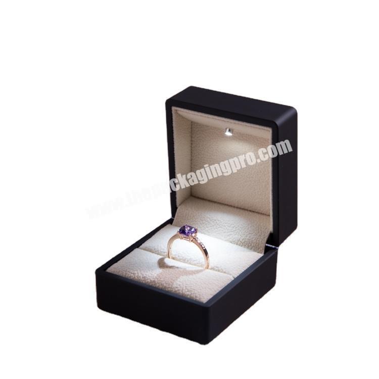 Plastic black Jewelry ring Box with rubber painting and LED light ring box size 6 x 6.5 x 4.9cm