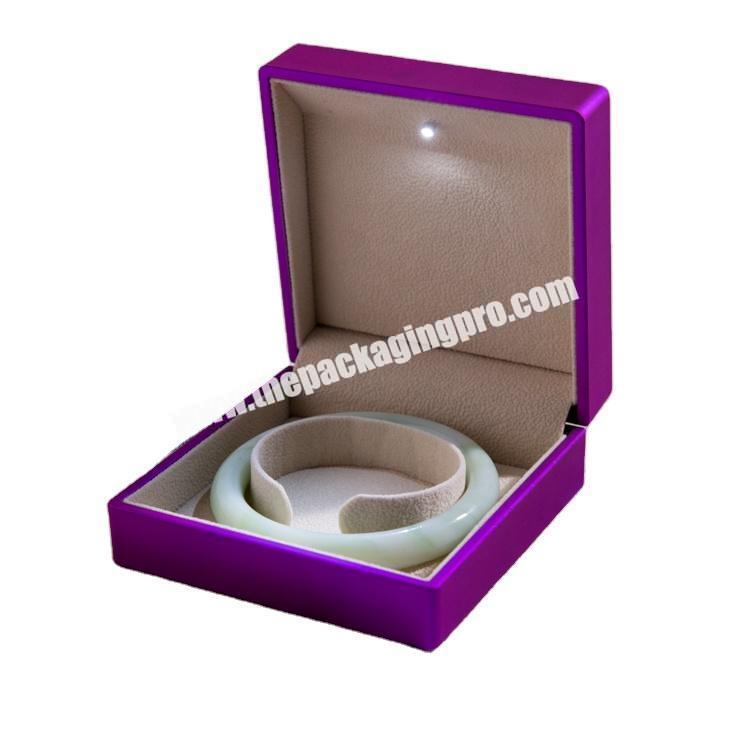 Plastic Jewelry bracelet Box in eco friendly rubber coating and LED light with bracelet box size 10 x 10 x 4.9cm in purple color
