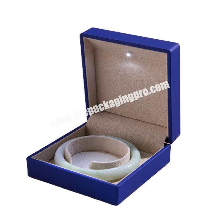 Plastic Jewelry bracelet Box in eco friendly rubber coating and LED light with bracelet box size 10 x 10 x 4.9cm