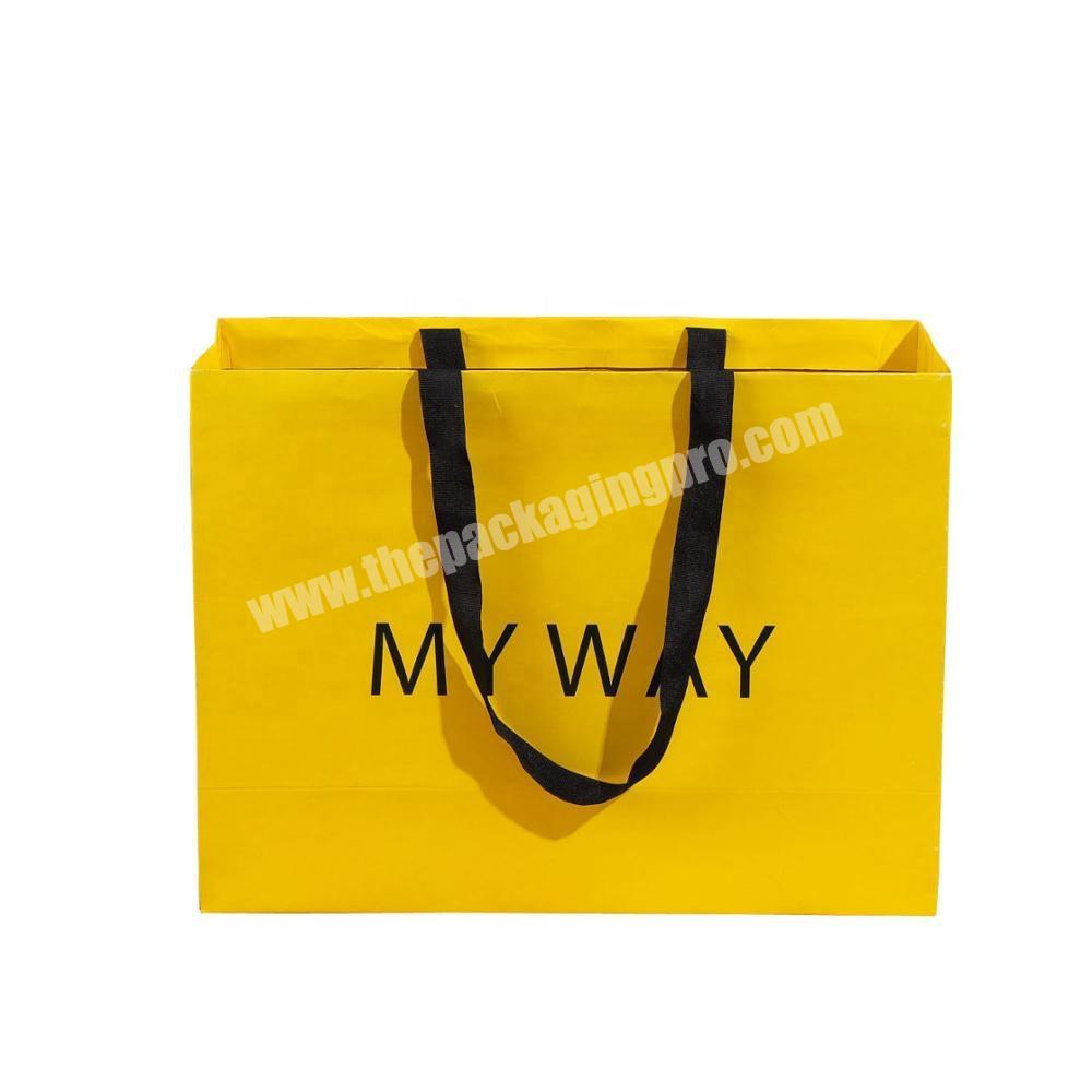 Popular Design customize ribbon handle clothing shopping paper bags