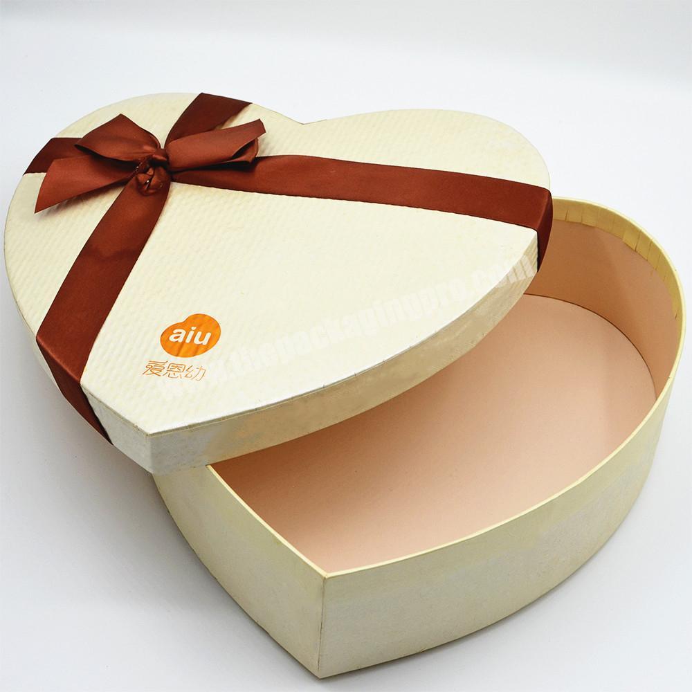 Premium heart shape rigid gift candy box offset printing with knotted ribbon on lid