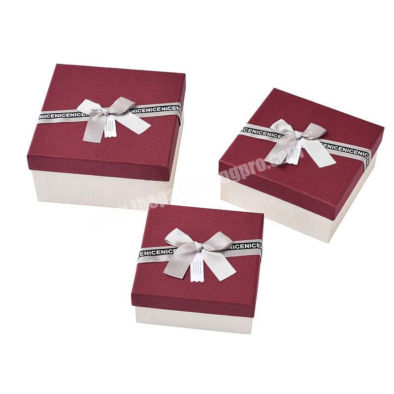 Red wedding rigid cosmetic paper gift set packaging box with bowknot