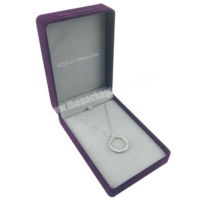 rounded rectangle velvet wrapped plastic jewellery necklace packaging with removable elastic inlay and silver logo