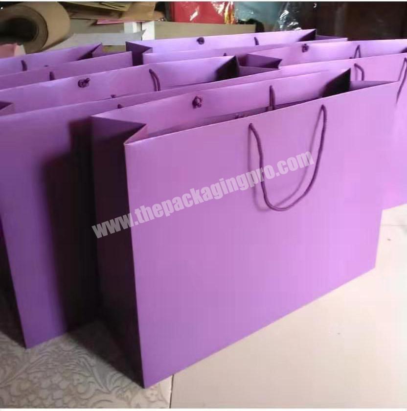Shopping bag modern  luxury colourful  apparel bag glossy lamination  paper bag for packaging