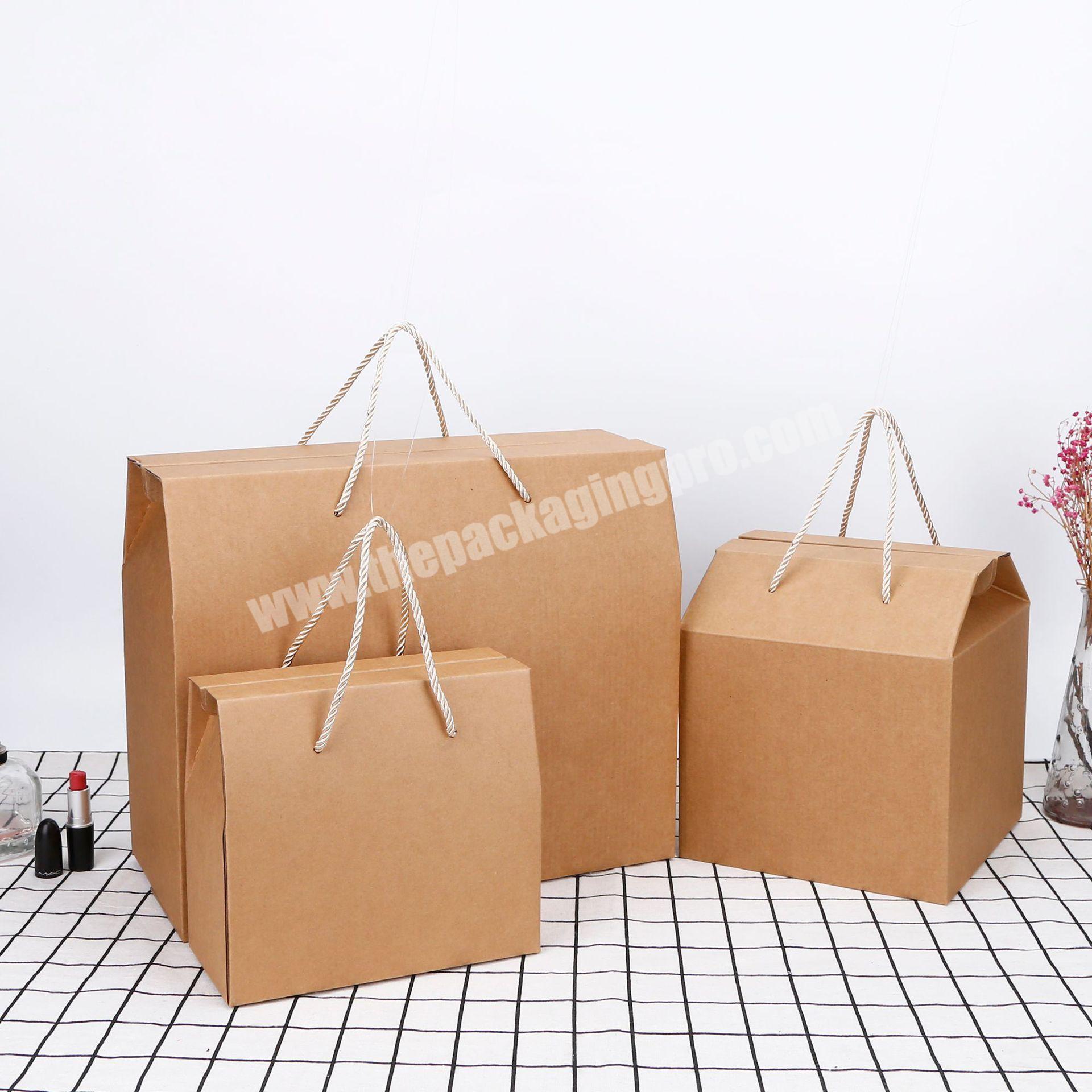 Simple design kraft paper packaging box with carry handle