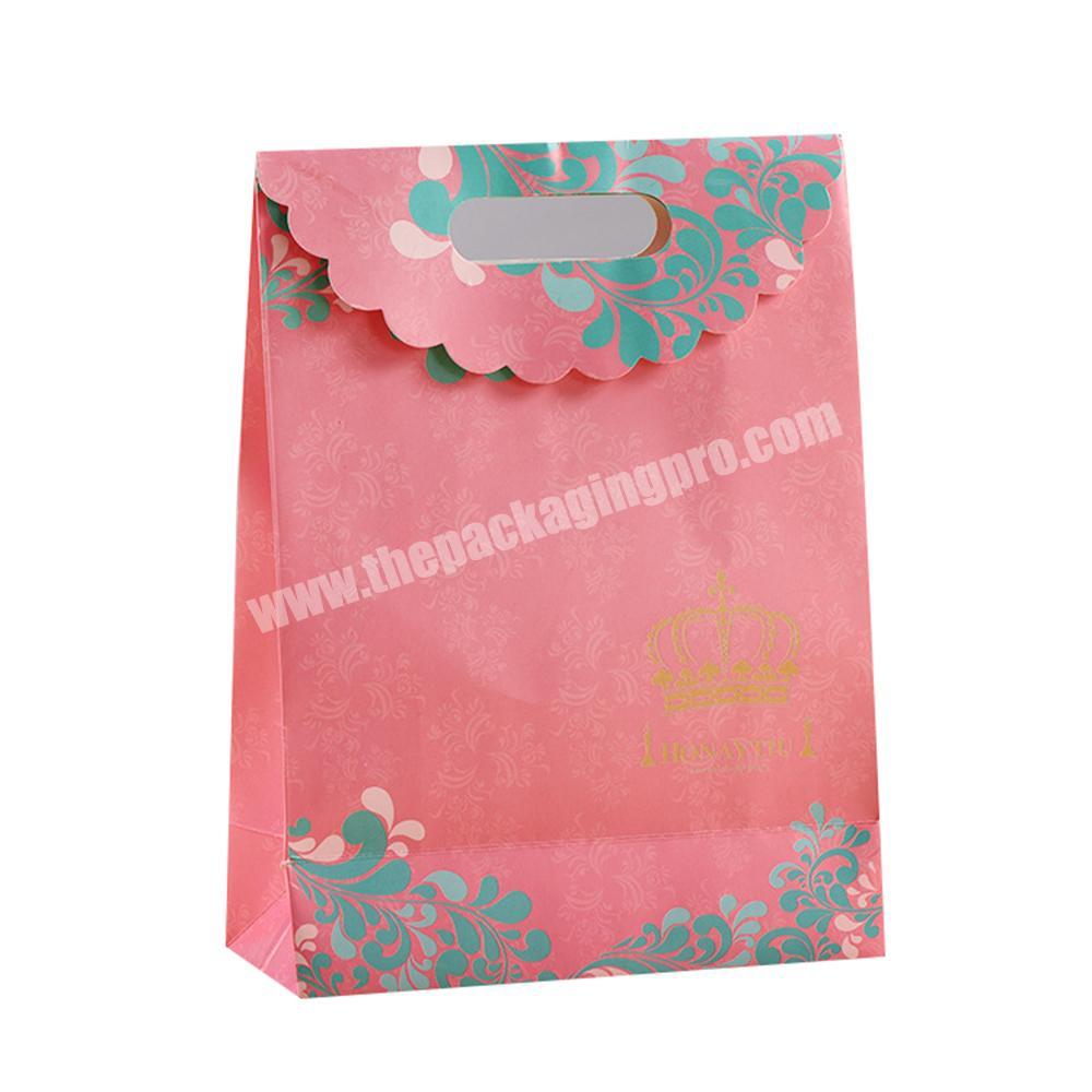 Small pink paper gift bag
