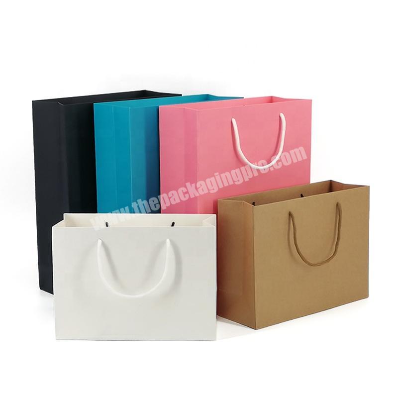 Various custom logo printed luxury promotional shopping kraft paper bag For Apparel Clothing Packing