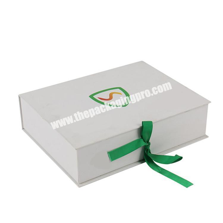 white cardboard dress packaging box with ribbon