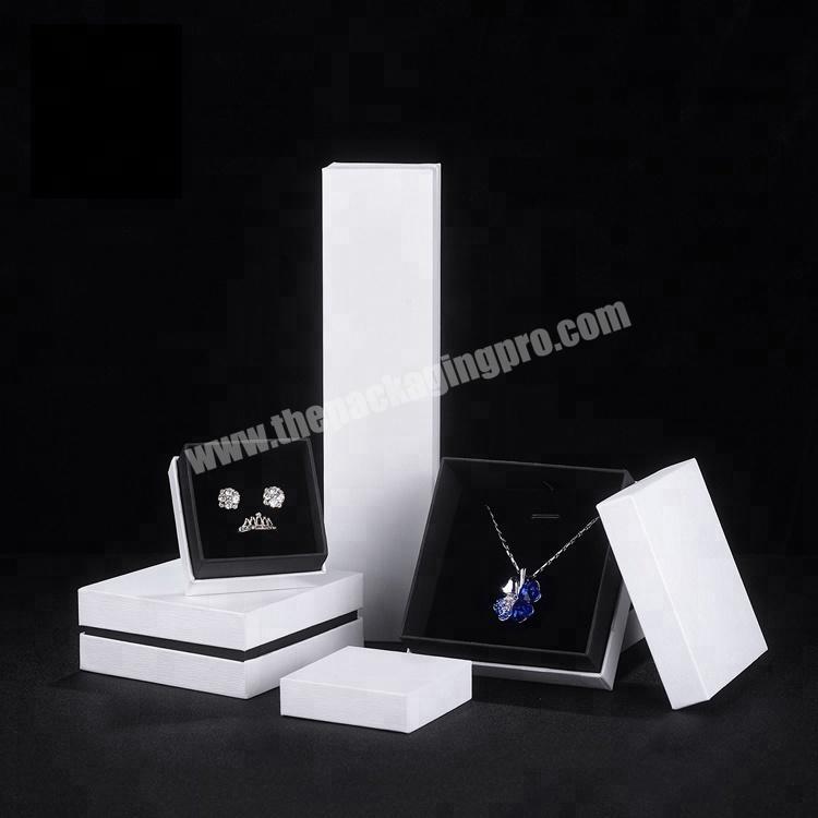 white linen embossed paperboard slotted lid and base jewelry box with gusset for cufflink