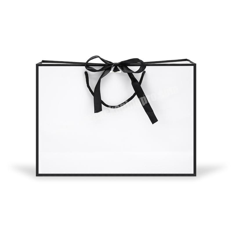 Wholesale 2019 new design white paper shopping bag for gift
