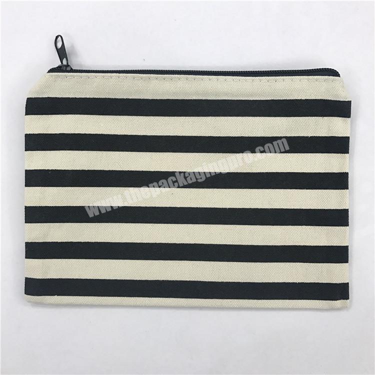 Tennis Canvas Pouch. - Open Inside; No Pockets - Zipper closure -  Approximately 7