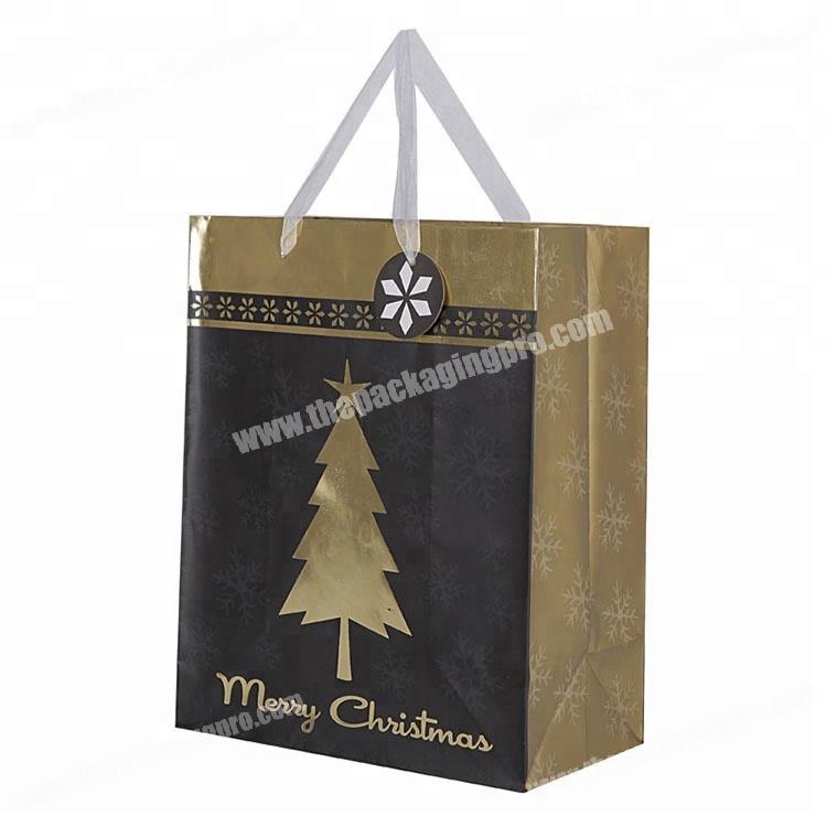 Wholesale Custom Christmas foil gift paper bags with ribbon handle