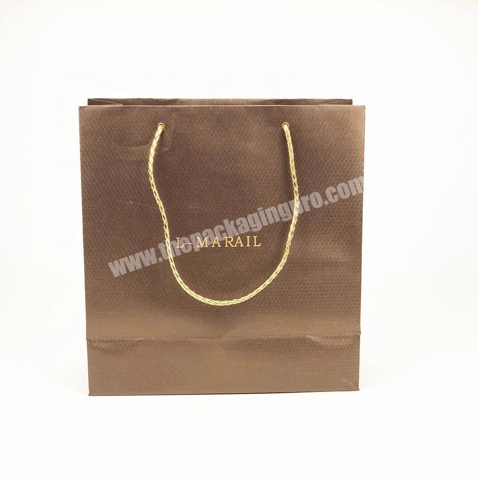 Wholesale Custom Golden Hot Stamping Logo Luxury Specialty Paper Packaging Gift Paper Bag For Garment