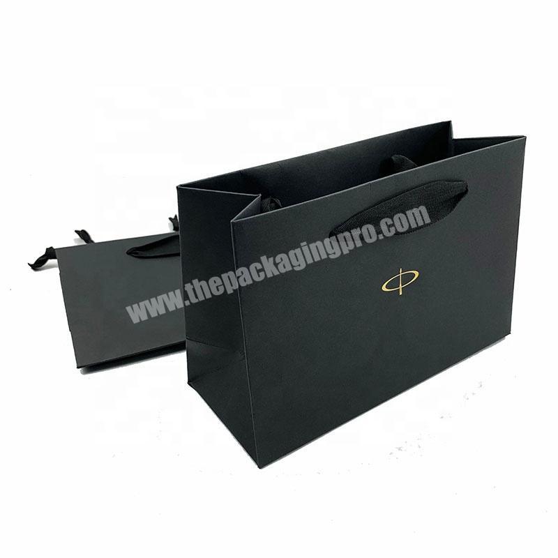 Wholesale custom logo black cardboard paper packaging gift bags for clothes