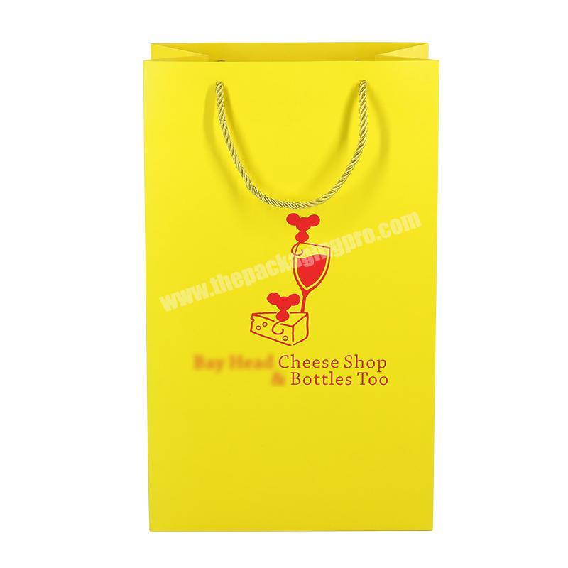 Wholesale custom paper shopping bag with logo print rope handle China