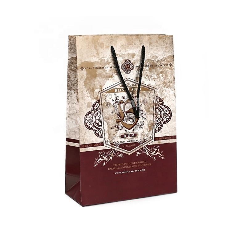 Wholesale Custom Print Luxury Art Cheap Paper Bags with our Own Logo