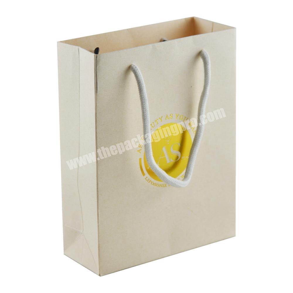 Wholesale Custom Printed Your Own Logo Brown Kraft Gift Craft Shopping Paper Bag With Handles for Body Wash Packaging