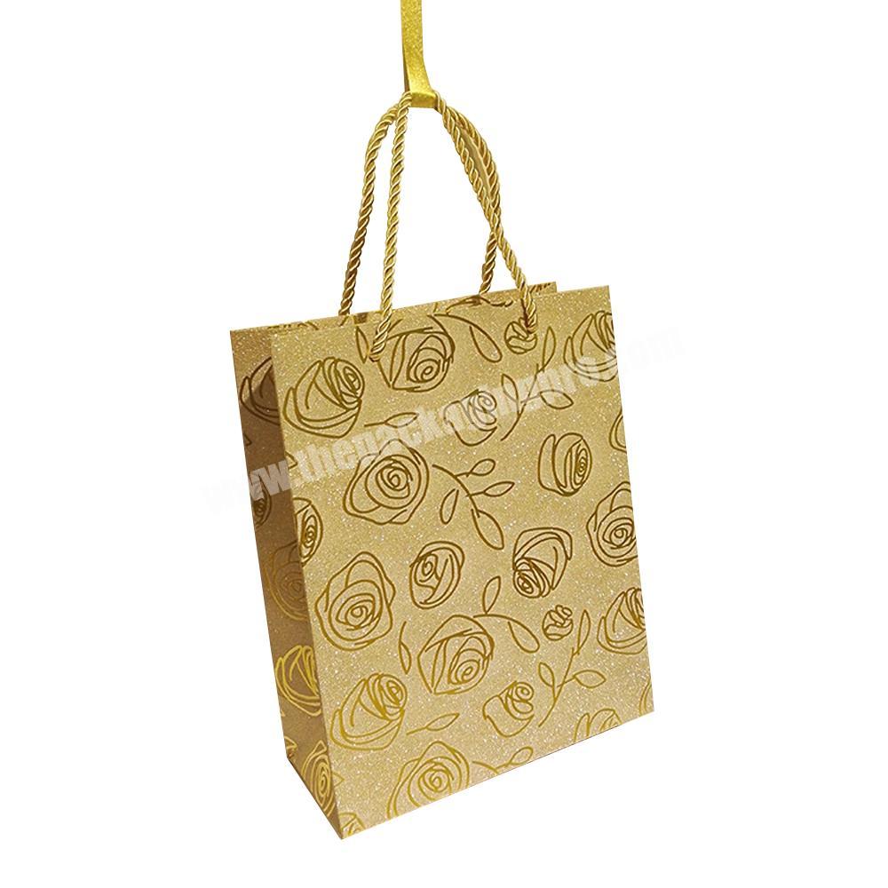 Wholesale custom shopping gift wrapping glitter paper bag with rope handles