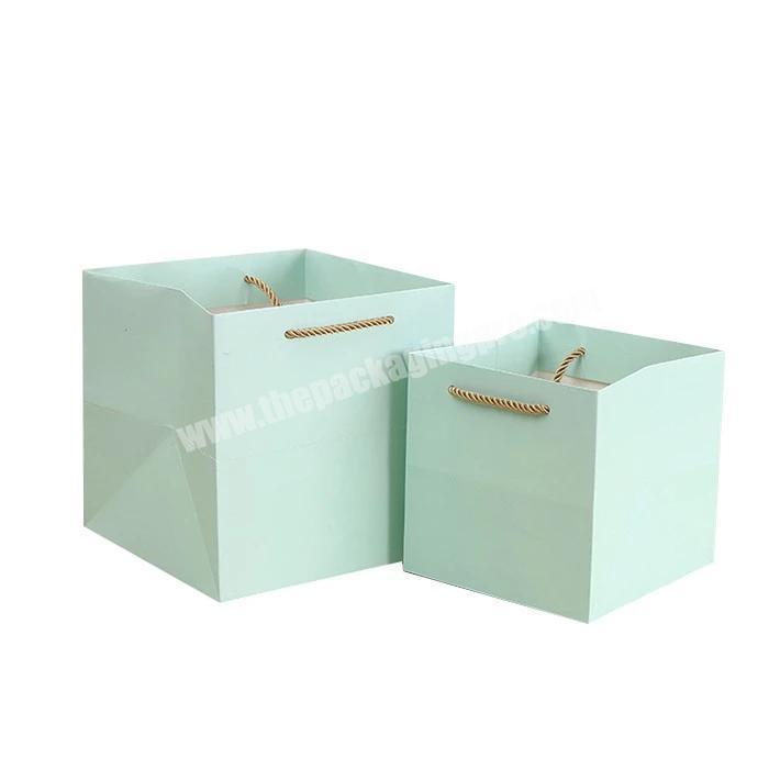 Wholesale fashion design custom paper gift bag for packaging with rope handle