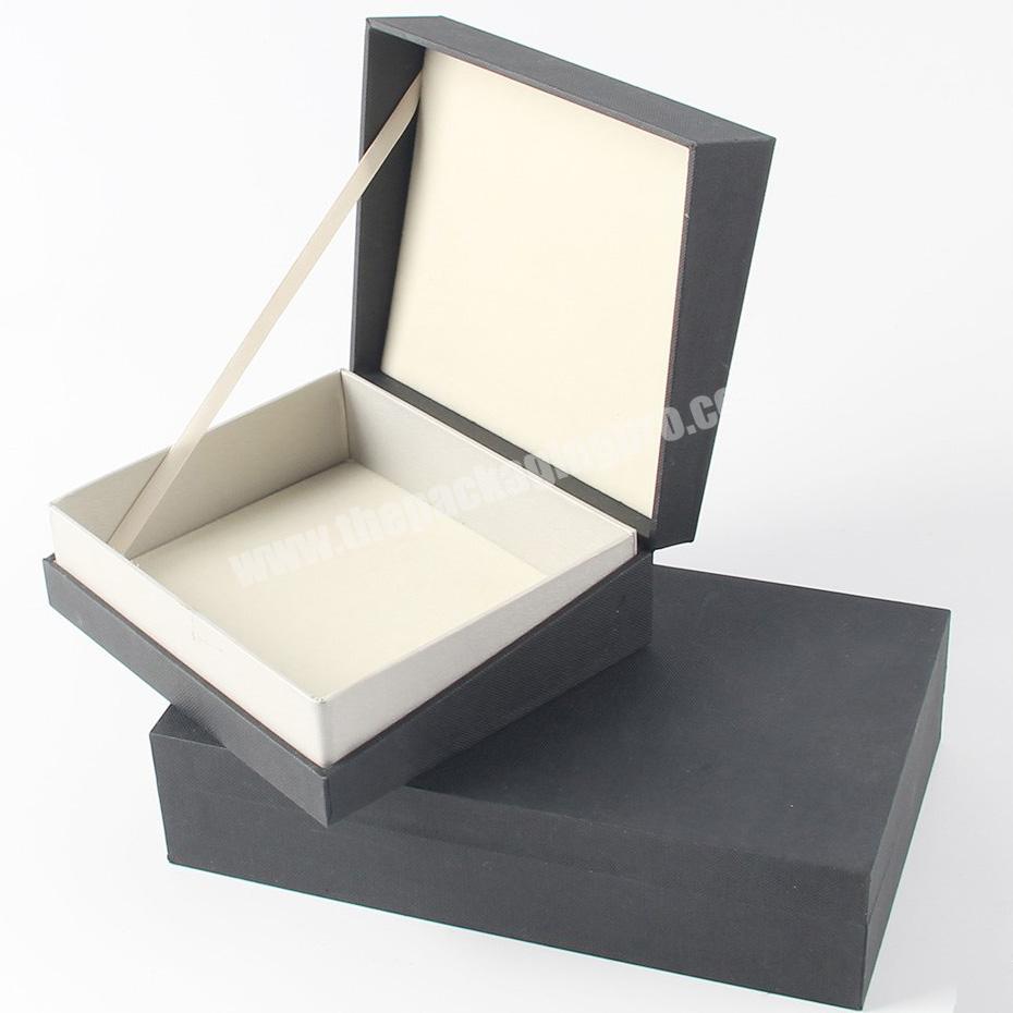 Wholesale paper box design magnetic closure luxury gift box with a ribbon .