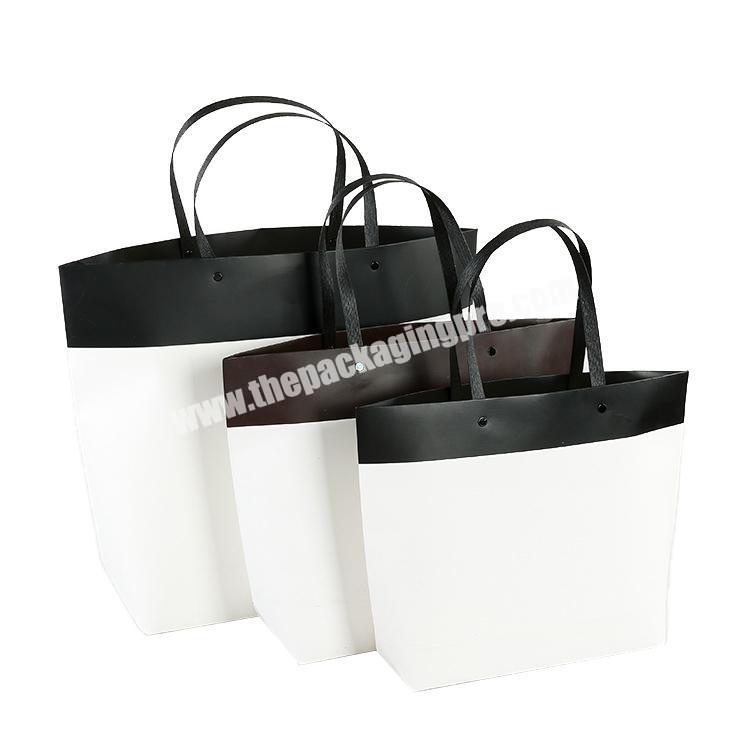 Wholesale Top Quality  Luxury Gift Paper Shopping Take Away Bag With Your Own Logo