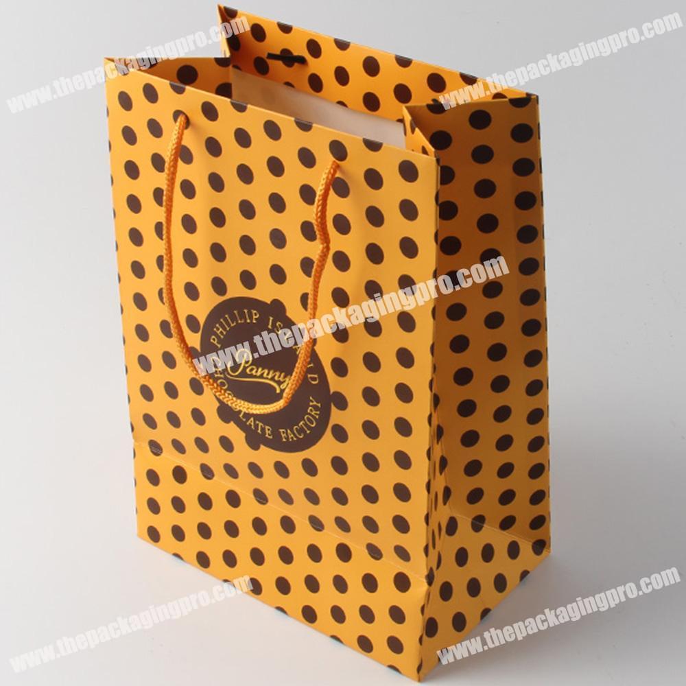 Xiamen paper bags factory supply christmas small colored paper bags with handles