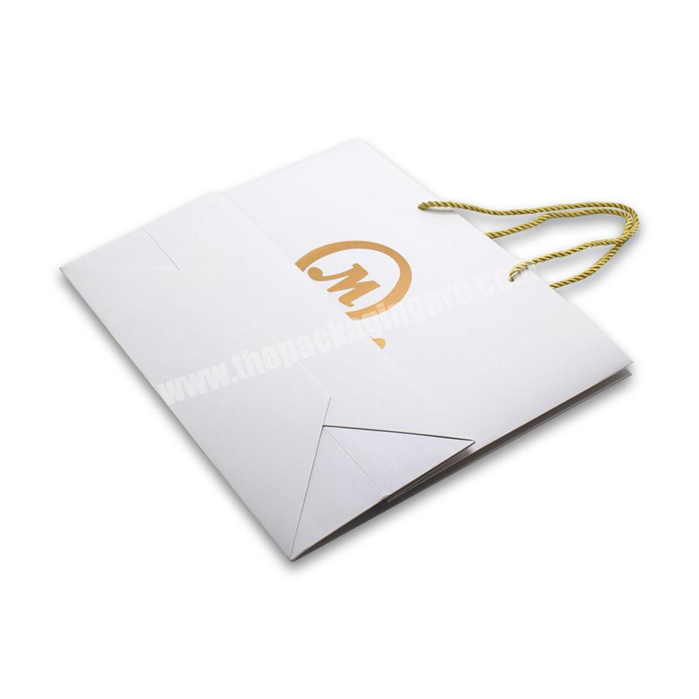 China Manufactures Custom Gold Foil Logo Baby Clothes Jewelry White Art Paper Bag With Handle