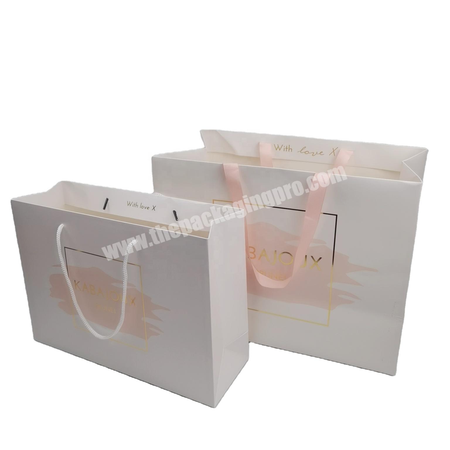 Custom 210g White Card Hot Foiled Logo Clothes Paper Bag With Ribbon Handle
