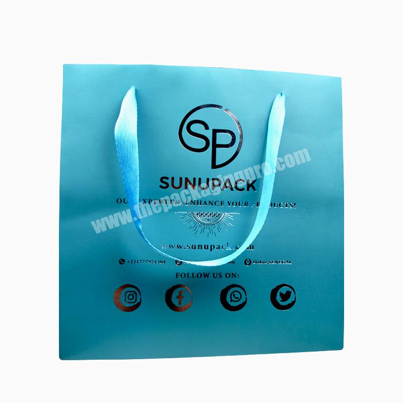 Free Sample  New Arrival Custom Blue Color Gift Packaging Art Paper Bag With Silver Foil