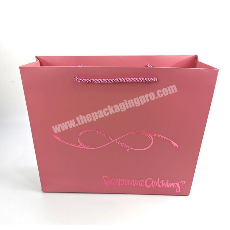 High quality Recycled shopping bags  custom logo printed hot stamping pink paper bag with ribbon for shopping