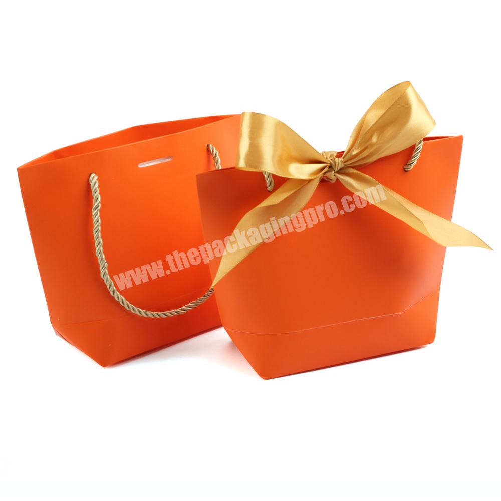 Hot Selling Custom Orange Color Printed Handmade Art Paper Packaging Gift Bags With Logo