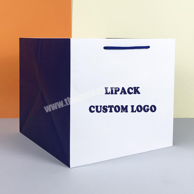 Paper Packaging Carry Bag Mockups - Graphicsfuel