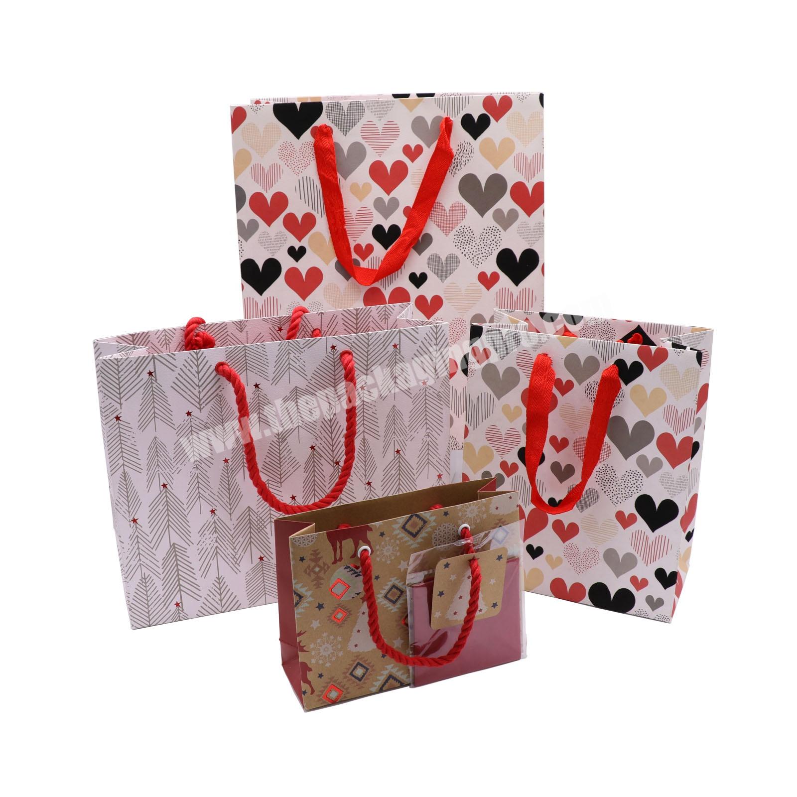 Luxury foil stamping christmas gift bags with handles reusable foldable paper shopping bag with your logo mini kraft paper bags