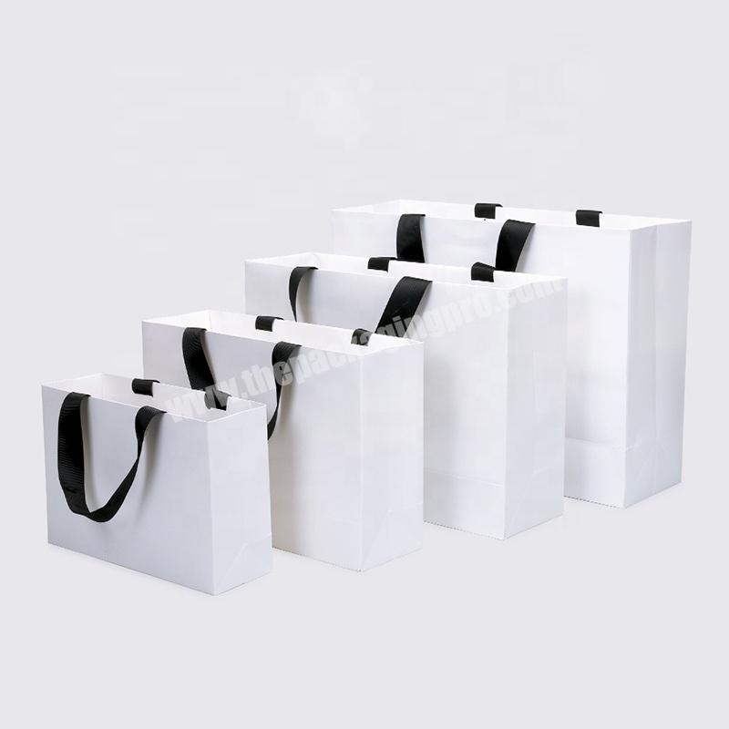 New Products Custom Logo Reusable Paper Bags Wholesale Luxury Shopping Packaging Paper Bags Eco-Friendly Garment Paper Bag