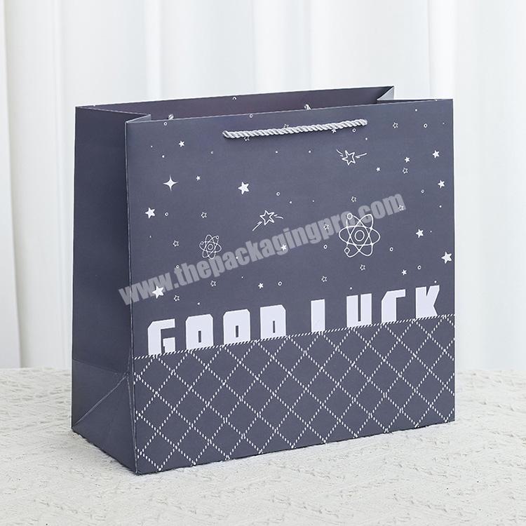 OEM Personalized Logo Luxury Fancy Paper Bags Gift Packaging Shopping Paper Bag With Own Design For Clothes Pants