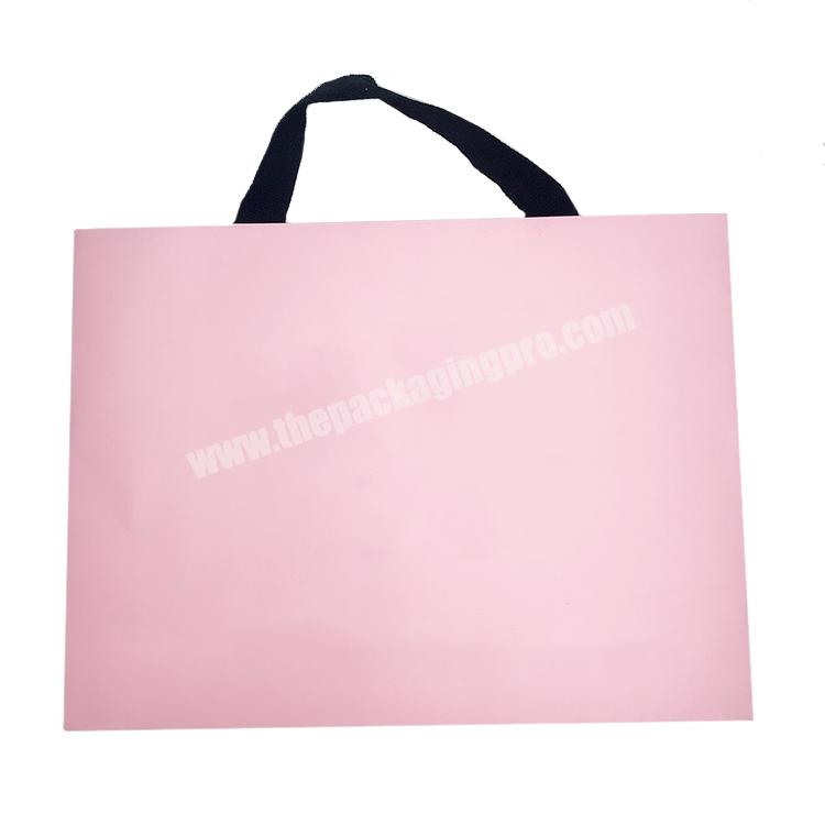 Wholesale Custom Logo Printed Simple Luxury Gift Art Paper Clothing Packaging Pink Bag With Handle