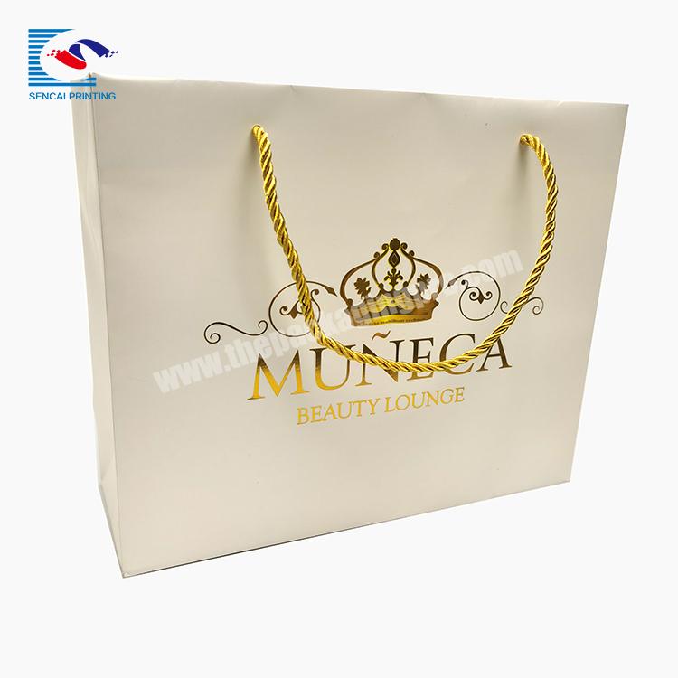 Wholesale top-ranking customized logo gift white art paper bag with gold foil