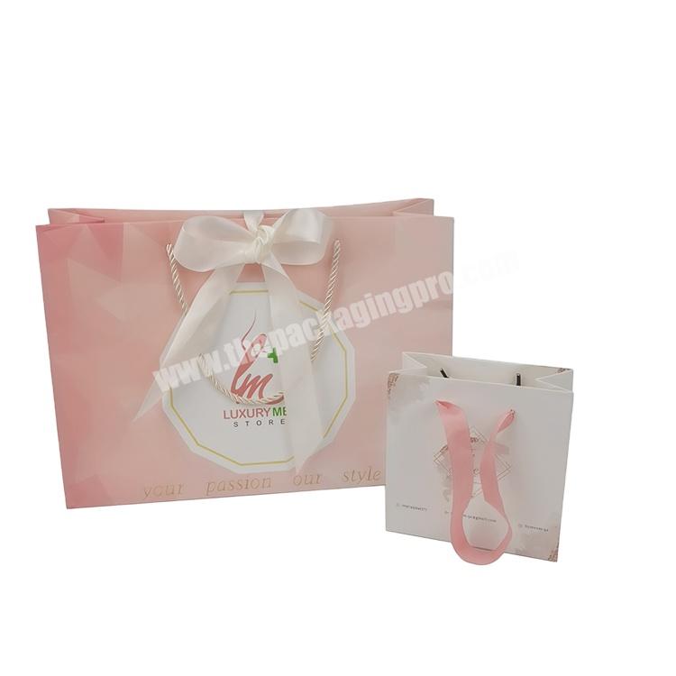 wholesale custom logo shopping pink color flower art paper bag with rope