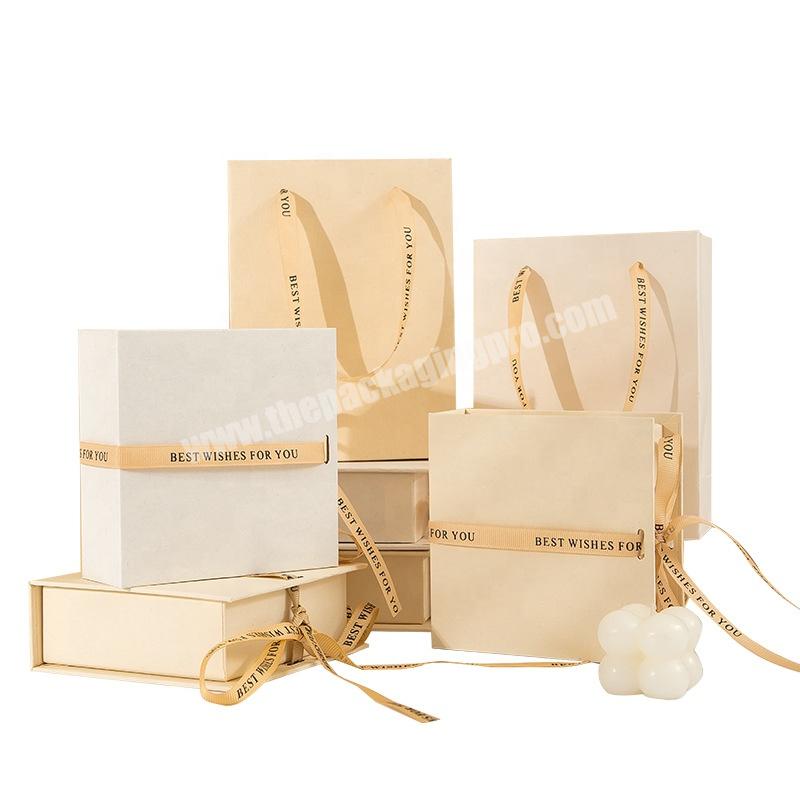 Custom Logo Printed Flip Gift Box Cream Cardboard Jewelry Packaging Box Magnet Display With Ribbon & Bag