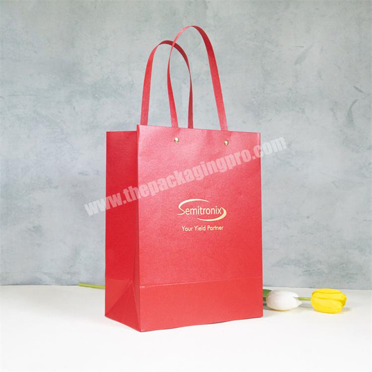 Custom Made Fancy Paper Gold Foil Advertising Gift Packaging Paper Bag with Rivet Plastic Handle