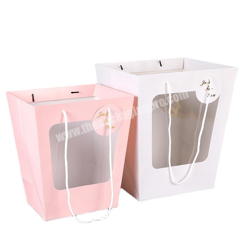 Holiday translucent paper bag trapezoidal window portable gift bag