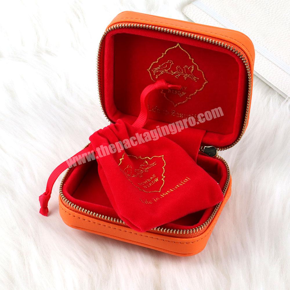 Jewelry boxes with custom logo jewelry packaging box and pouch luxury leather jewelry ring box orange with zipper