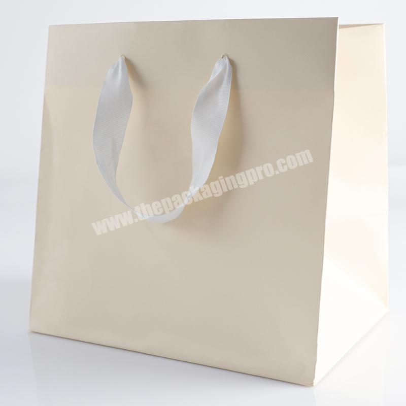 Logo printing luxury reusable drawstring your own logo bridesmaid cardboard paper gift bag cute thank you beauty gift bag