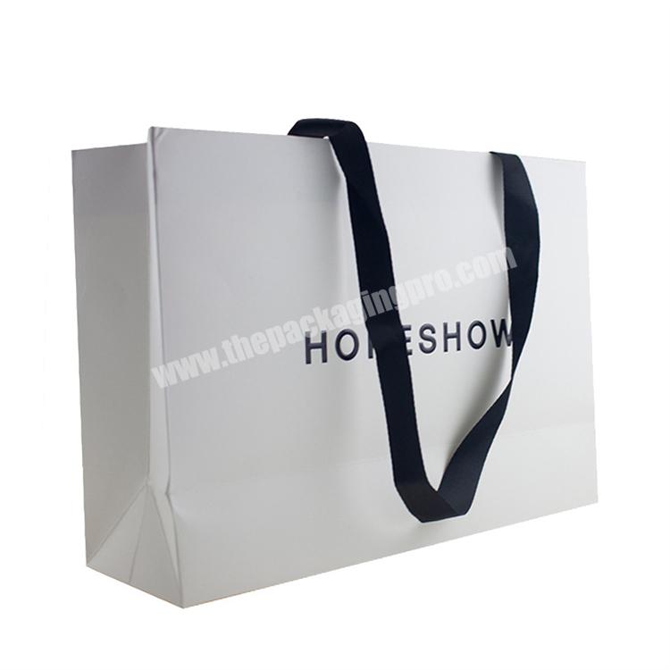 Low Cost High Quality Black Embossing Logo Recycled White Cardboard Shopping Gift Paper Bags