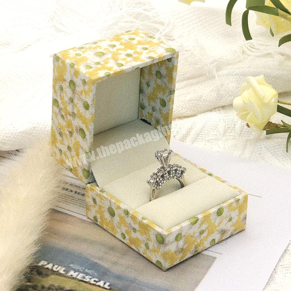 Luxury cardboard canvas print design flip ring packaging jewelry boxes with logo custom jewelry box packaging ring jewelry boxes