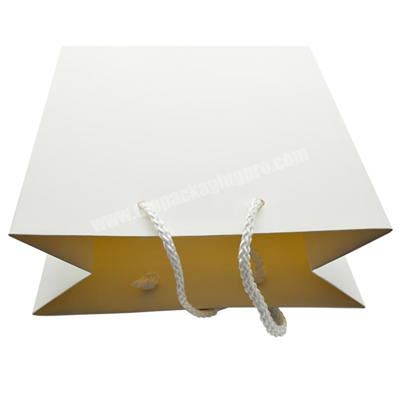 White Wholesale Custom Printed Logo Gift  Paper Bag  Packaging  For Shoes Clothing Shopping Paper Bag With Handle