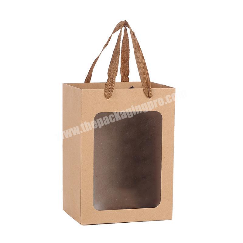 Wholesale high quality waterproof kraft paper bag transparent window handbag gift bag