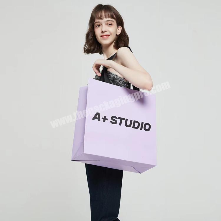luxury printed clothing jewelry packaging kraft paper bag with seal custom paper bags with logo