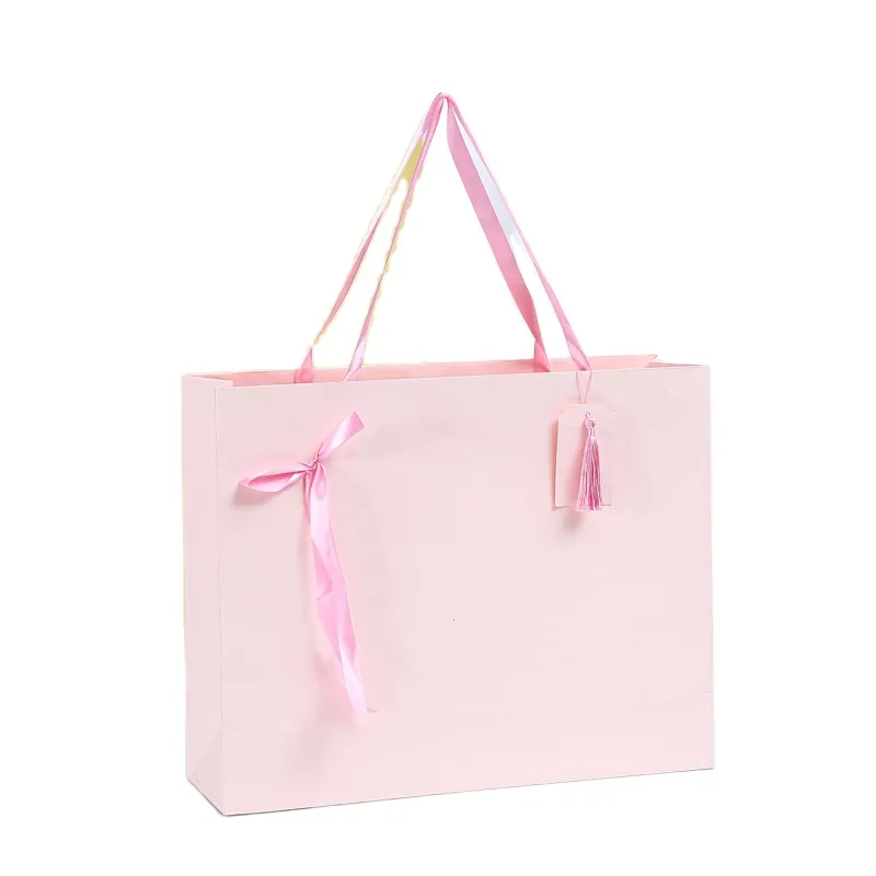 China Manufacturer Custom Wholesale Tote Carry Personalized Biodegradable Luxury Clothing Pink Cardboard Paper Packaging Bag - Buy Custom Wholesale Biodegradable Recyclable Personalized Eco Friendly Luxury Shopping Foldable Packaging Gift Bagswith Lo