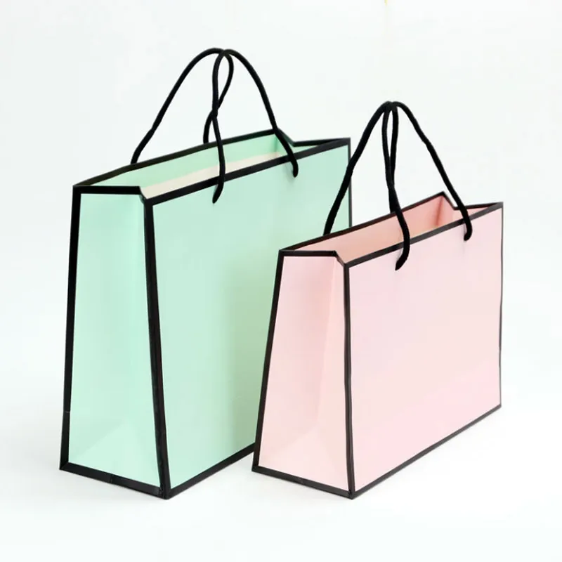 Wholesale Custom printed logo eco white cardboard paper shopping fashion  gift bag for shop Manufacturer & Supplier - Cxgiae